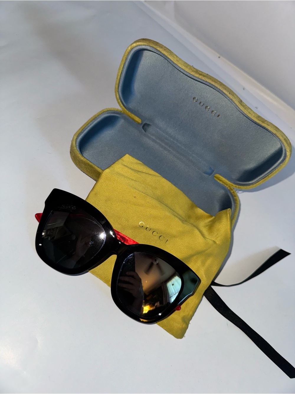 Gucci Black Sunglasses with Red Temple Accents